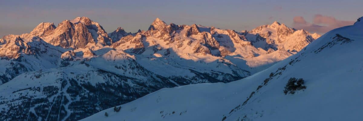 Snow-covered mountains in Montgenèvre at sunrise